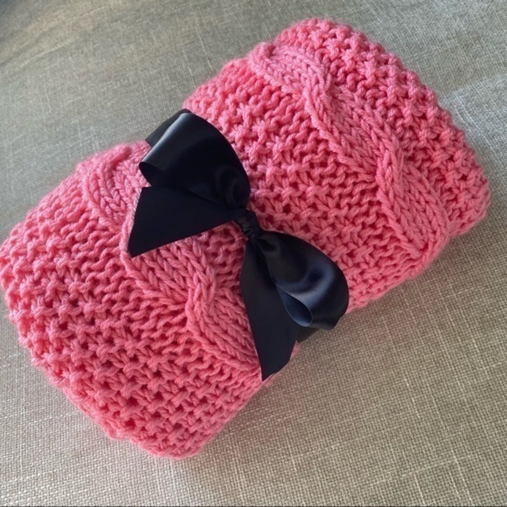 Handmade knitted blanket with cable pattern